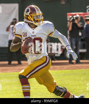 Oakland, California, USA. 29th Sep, 2013. Washington Redskins quarterback Robert Griffin III (10) loose with the ball on Sunday, September 29, 2013, in Oakland, California. The Redskins defeated the Raiders 24-14. Credit: Al Golub/ZUMA Wire/Alamy Live News Stock Photo