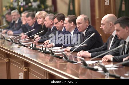 Moscow, Russia. 26th December, 2018. Russian President Vladimir Putin and Prime Minister Dmitry Medvedev, center, sit with members of their government during the year end meeting with government leaders and officials at the Kremlin December 26, 2018 in Moscow, Russia. Credit: Planetpix/Alamy Live News Stock Photo