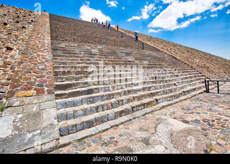 Mexico City, Mexico-21 April, 2018: Tourists climbing landmark ancient Teotihuacan pyramids in Mexican Highlands