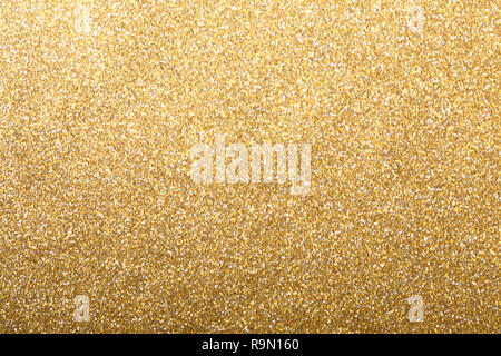 Gold silver glitter background, shiny wrapping paper  defocus Stock Photo