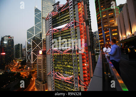 Enjoying cocktails and drinks with the fabulous views of Hong Kong. Stock Photo