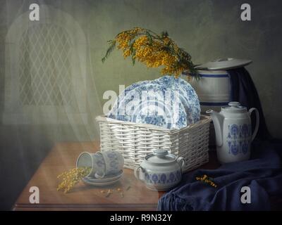 Still life with mimosa branches Stock Photo