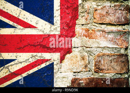 Cracked brick wall with British flag - concept image Stock Photo - Alamy
