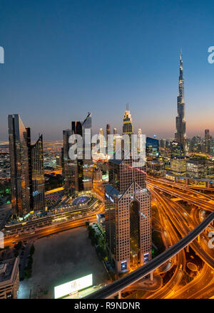 Skyline of Dubai and Burj Khalifa skyscraper at dusk in Dubai, United Arab Emirates