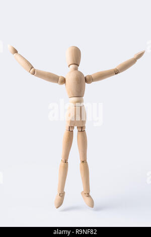 Business and design concept - wooden mannequin with open arm gesture isolated on white background Stock Photo