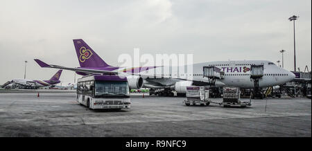 Bangkok, Thailand - Sep 15, 2018. A Boeing 747-400 airplane of Thai Airways docking at Bangkok Suvarnabhumi Airport. Stock Photo
