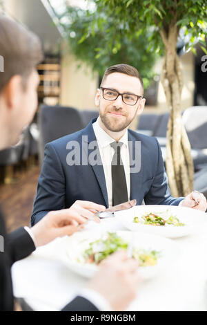 Having lunch in restaurant Stock Photo