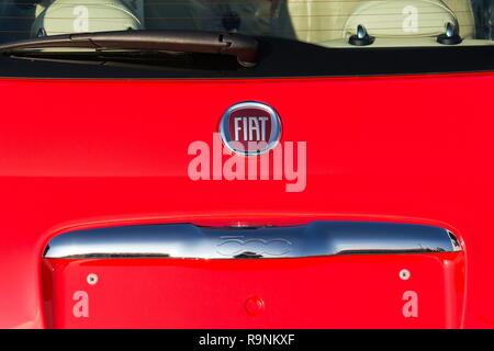 PRAGUE, CZECH REPUBLIC - DECEMBER 13 2018: Fiat automobiles S. p. A. group company logo on car in front of dealership building on December 13, 2018 in Stock Photo