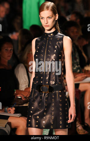 NEW YORK - SEPTEMBER 12: A model walks the runway at the MICHAEL KORS Spring/Summer 2013 collection Mercedes-Benz Fashion Week in New York on Septembe Stock Photo