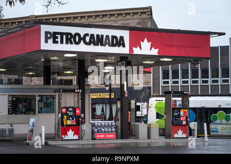 MONTREAL, CANADA - NOVEMBER 6, 2018: Petro-Canada logo in front of one of their gas stations in Canada. Belonging to Suncor Energy, petro Canada is a  Stock Photo