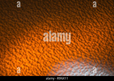 Rough surface of polystyrene ceiling tiles. Metaphor rough surface, abstract texture, rough texture, bumpy, insulation foam. Bumpy surface texture. Stock Photo