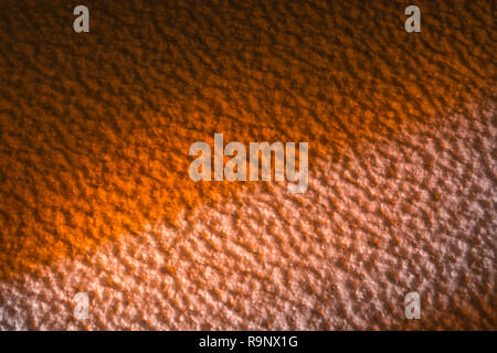 Rough surface of polystyrene ceiling tiles. Metaphor rough surface, abstract texture, rough texture, bumpy, insulation foam. Bumpy surface texture. Stock Photo