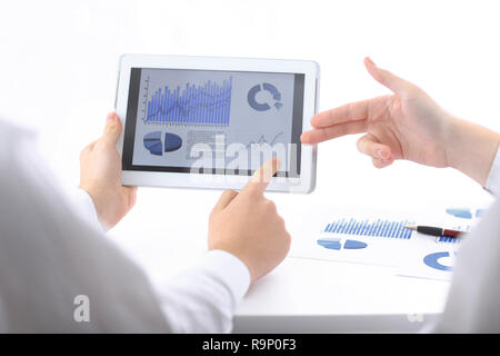 businessman pointing with pen on a digital tablet screen. Stock Photo