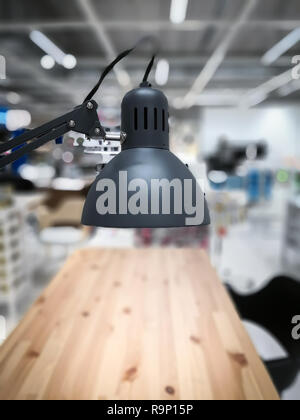 Black decorative lamp on the table with copy space. Stock Photo