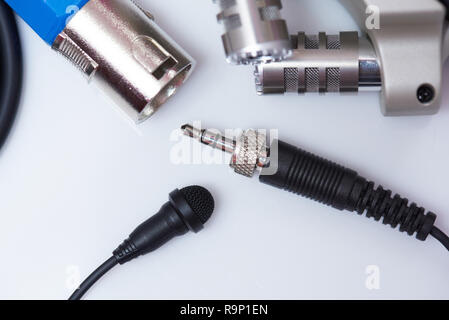 Lavalier microphone with audio plug close up view on white background Stock Photo