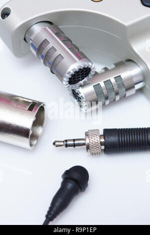 Microphone and audio jack on white background close up view Stock Photo