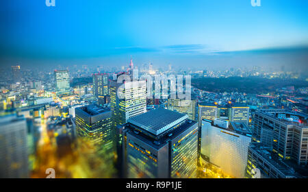 Asia business concept for real estate and corporate construction - panoramic city skyline aerial view under blue sky & sun in Shinjuku Tokyo, Japan wi Stock Photo