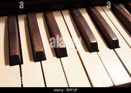 Close up of the wooden keys of an old pump organ Stock Photo