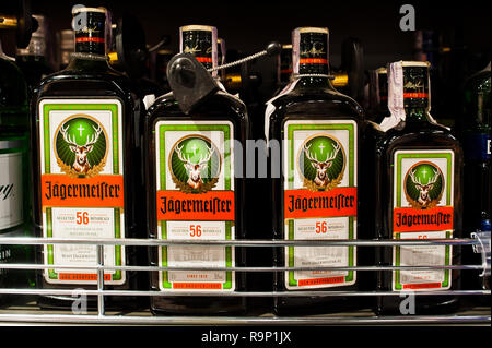 Kyiv, Ukraine - December 19, 2018: Bottles of Jagermeister on shelves in a supermarket. Jägermeister is a Braunschweig, Lower Saxony, Germany digestif Stock Photo