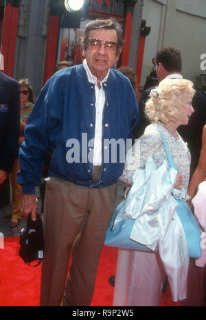 HOLLYWOOD, CA - JUNE 19: Actor Walter Matthau and wife Carol Grace attend Warner Bros. Pictures' 'Dennis The Menace' Premiere on June 19, 1993 at Mann's Chinese Theatre in Hollywood, California. Photo by Barry King/Alamy Stock Photo Stock Photo