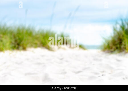 Defocused on white sandy beach on scenic panorama Stock Photo