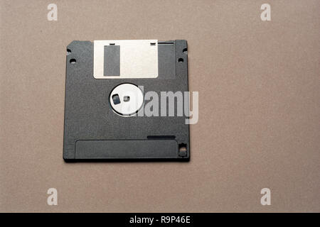 Floppy disk 3.5 inch nostalgia on yellow color background for creative design, CD, poster, book, printing, gift card, flyer, magazine, print Stock Photo