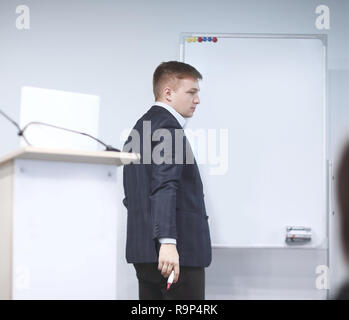 business presentation.businessman writes a marker on the Board Stock Photo