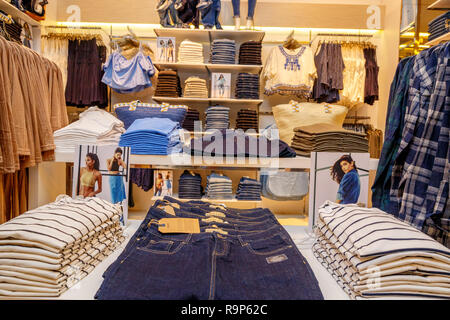 COLOMBO, SRI LANKA - SEPTEMBER 05, 2016:  Wide View of Ladies wear Clothes, Dresses, Skirts, Frocks, Trousers, Jackets, with Shelves, Racks and Hanger Stock Photo