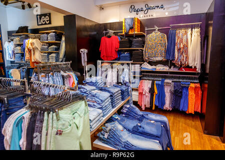 COLOMBO, SRI LANKA - SEPTEMBER 05, 2016:  Wide View of Ladies wear Clothes, Dresses, Skirts, Frocks, Trousers, Jackets, with Shelves, Racks and Hanger Stock Photo