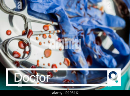 Search in the doctor network, Gloves blue and scissors stained with blood on a tray in an operating theater, conceptual image Stock Photo