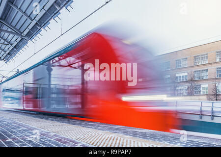 Arrival of the train to the railway station on Moscow Central Circle. Russia. Stock Photo