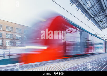Arrival of the train to the railway station on Moscow Central Circle. Russia. Stock Photo