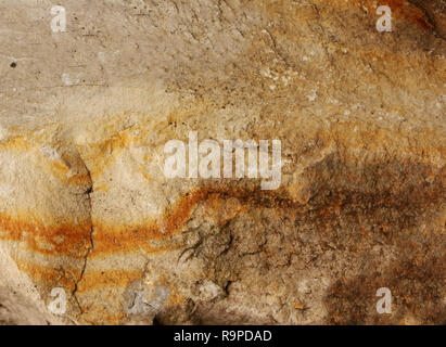 Wall of an ancient cave Stock Photo