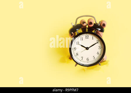 clock yellow alamy strikes ten hours face wake alert routine alarm holding hole banner morning concept copy space through paper