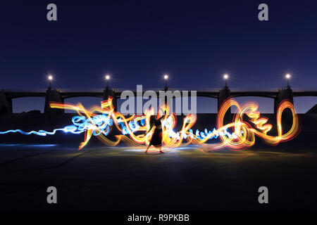 Night Time Unique Light Painted Imagery With Color and Fire Stock Photo