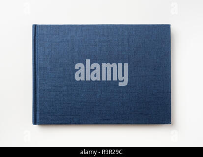 Design concept - Top view of blue hardcover notebook isolated on background for mockup Stock Photo