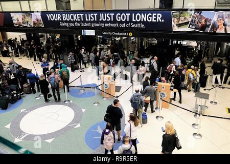 Passengers in line to go through TSA security checkpoint at Seattle–Tacoma International Airport in Seattle, Washington, USA. Stock Photo