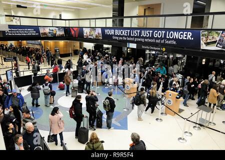 Passengers in line to go through TSA security checkpoint at Seattle–Tacoma International Airport in Seattle, Washington, USA. Stock Photo