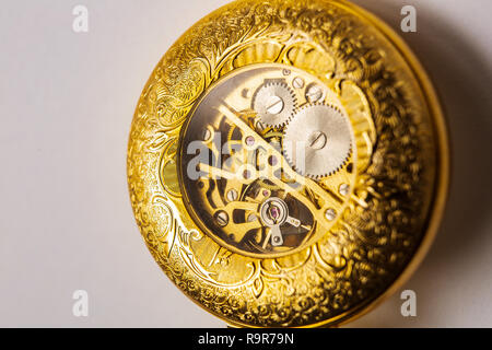 the inside of a classic watch. gear wheels of a pocket watch. Stock Photo