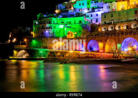 ATRANI, ITALY - DECEMBER 8, 2018: colored lights to celebrate Christmas in Atrani night, southern Italy Stock Photo