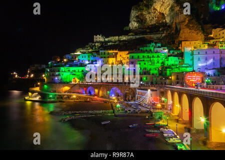 ATRANI, ITALY - DECEMBER 8, 2018: colored lights to celebrate Christmas in Atrani night, southern Italy Stock Photo