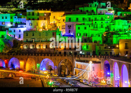 ATRANI, ITALY - DECEMBER 8, 2018: colored lights to celebrate Christmas in Atrani night, southern Italy Stock Photo