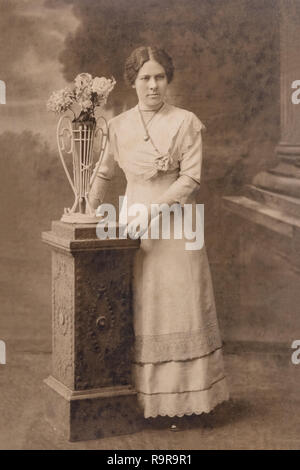 RUSSIA - CIRCA 1905-1910: A portrait of young woman in studio, Vintage Carte de Viste Edwardian era photo Stock Photo