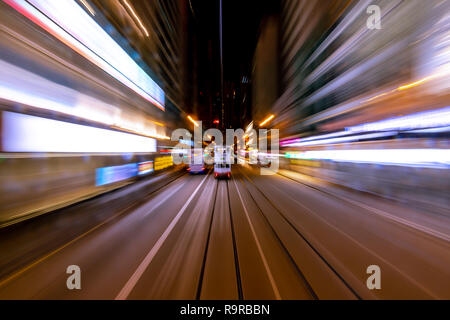 Blurred Motion Travel in Business District of Hong Kong Stock Photo