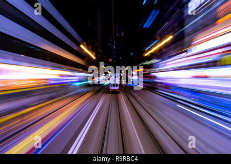 Blurred Motion Travel in Business District of Hong Kong Stock Photo