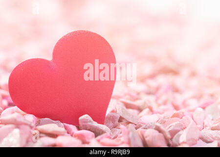 The heart on pink stones in retro style. Concept of love for Valentine's Day, free space on the right Stock Photo