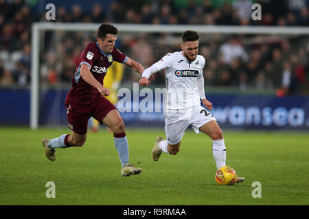 Swansea, UK. 26th Dec, 2018. Matt Grimes of Swansea City in action (r).EFL Skybet championship match, Swansea city v Aston Villa at the Liberty Stadium in Swansea, South Wales on Boxing day, Wed 26th December 2018. this image may only be used for Editorial purposes. Editorial use only, license required for commercial use. No use in betting, games or a single club/league/player publications. pic by Andrew Orchard/Andrew Orchard sports photography/Alamy Live news Credit: Andrew Orchard sports photography/Alamy Live News Stock Photo