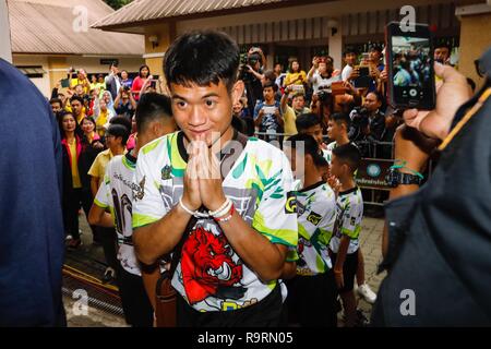 (181227) -- BEIJING, Dec. 27, 2018 (Xinhua) -- Photo taken on July 18, 2018 shows the 12 boys and their football coach rescued from a flooded cave in northern Thailand make their first public appearance at a press conference in Bangkok, Thailand. A Thai soccer team of 12 boys aging between 11 and 16 and their coach were trapped in a flooded cave on June 23. All of them were successfully rescued after 18 days, thanks to the joint efforts by more than 1,000 personnel from local and international rescue teams from China, the United States, Britain and other countries. (Xinhua/Rachen) TOP 10 WORLD Stock Photo