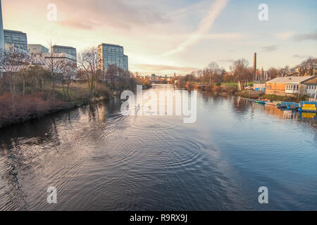 Glasgow, Scotland, UK. 28th December, 2018. UK Weather. Rowers training on a calm River Clyde on a cold, sunny afternoon. Credit: Skully/Alamy Live News Stock Photo