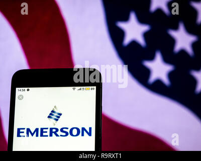 December 18, 2018 - Kiev, Ukraine - Emerson Electric Manufacturing company logo seen displayed on a smart phone. (Credit Image: © Igor Golovniov/SOPA Images via ZUMA Wire) Stock Photo